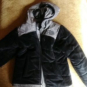 The North Face coat worn by 6 old year daughter.